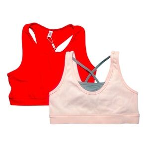 Red activewear top and pink/gray sports bra